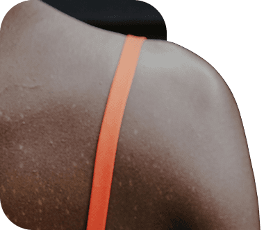 Person carrying a pack with shoulder straps visible