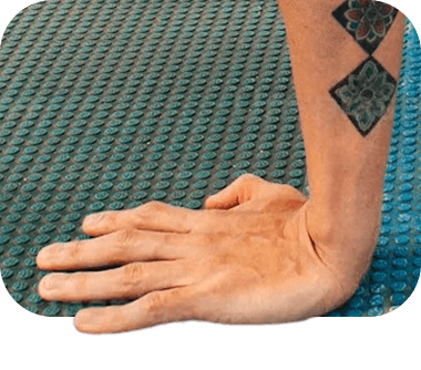 Hand and wrist pressed flat against a surface