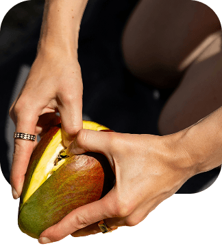 Hands holding fresh fruit