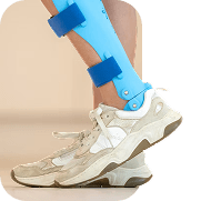 Lower leg in an orthopaedic brace and sneaker